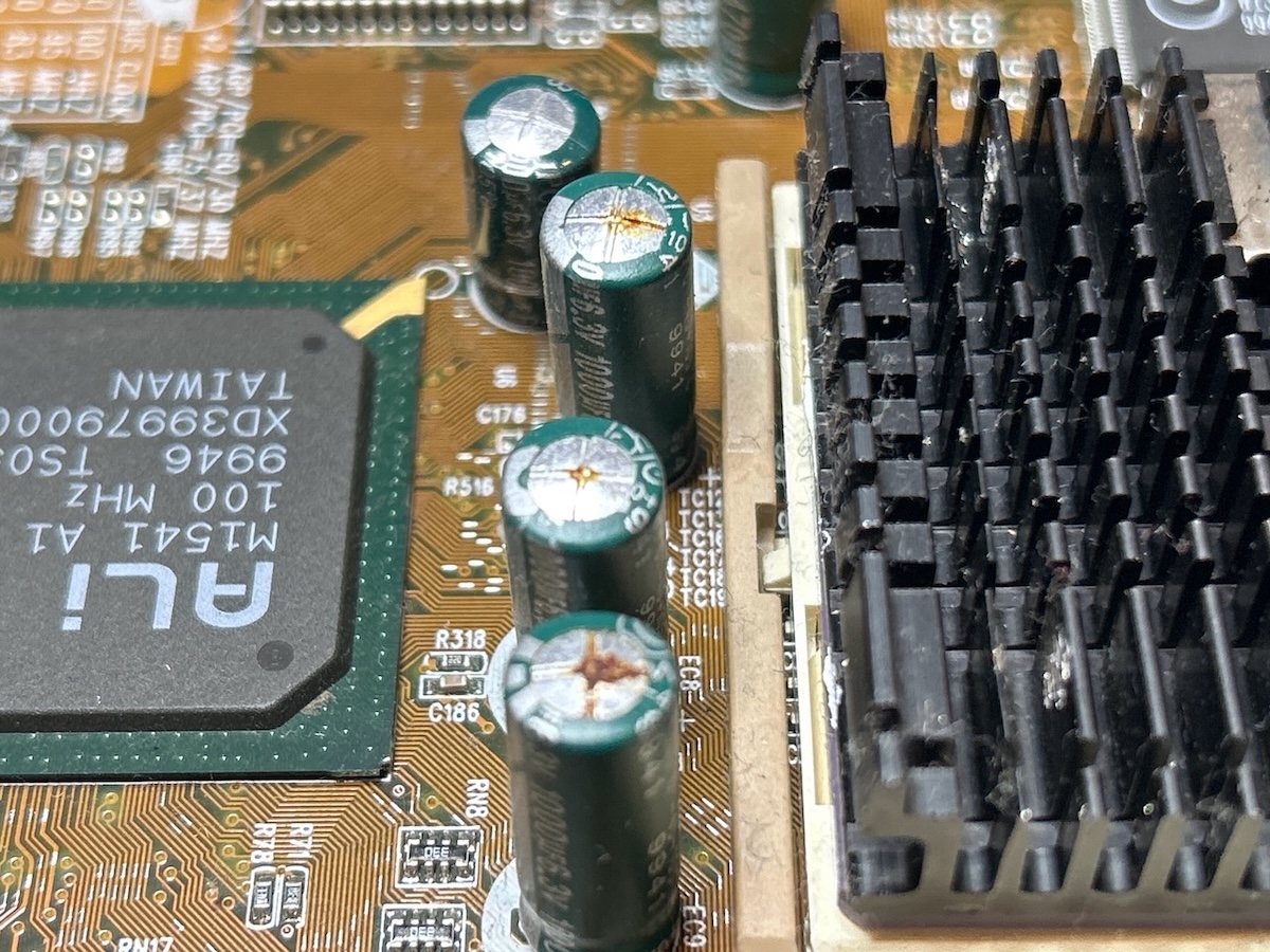 Rusted and bulging caps